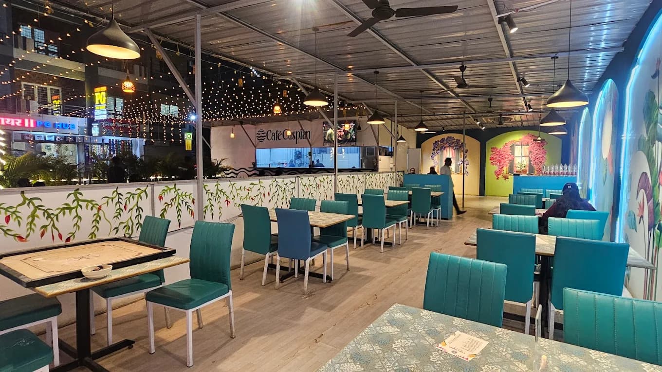 Exterior and cozy ambience of Café Caspian located near Shinde Chowk in Pune
